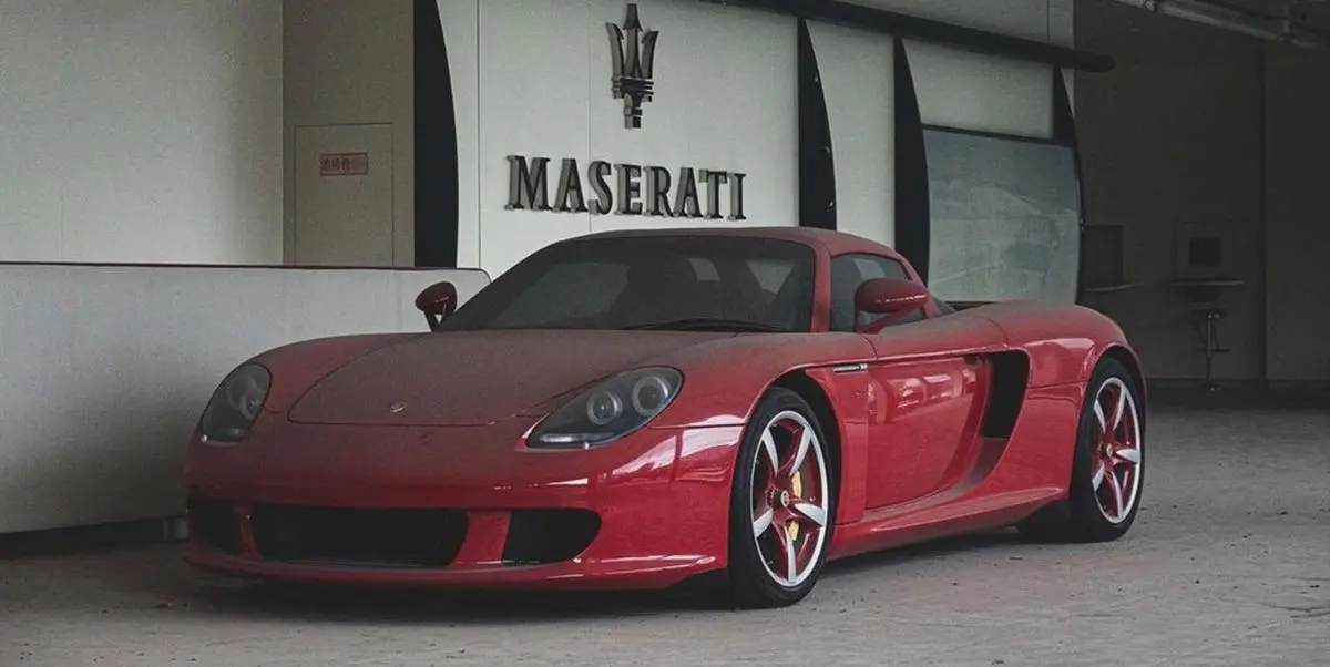 autos ferrari pechito de carrera gt - Cuántos Porsche Carrera GT rojos hay