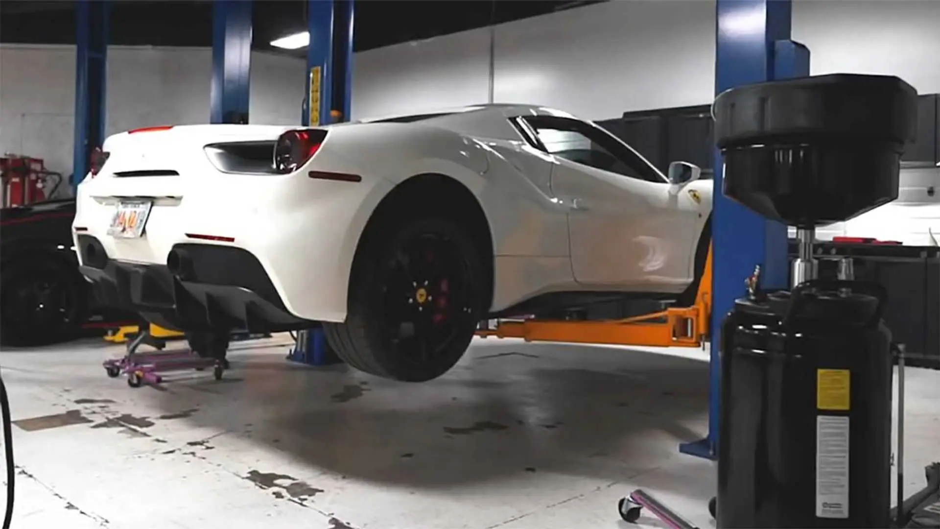 ferrari to much oil in car - How do you fix overfilled oil