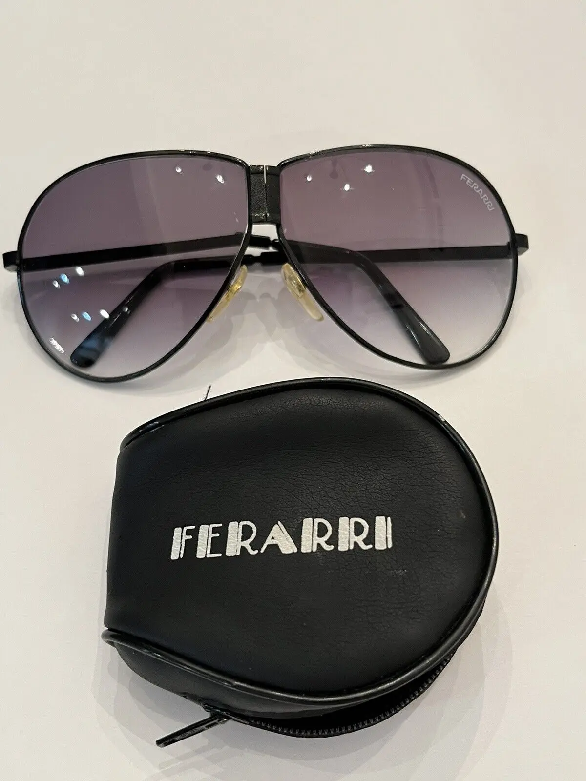 ferrari folding sunglasses - What glasses did Carroll Shelby wear